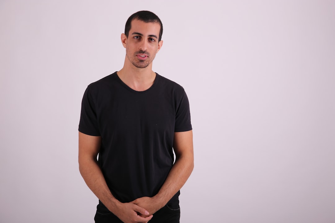 man in white v neck t-shirt